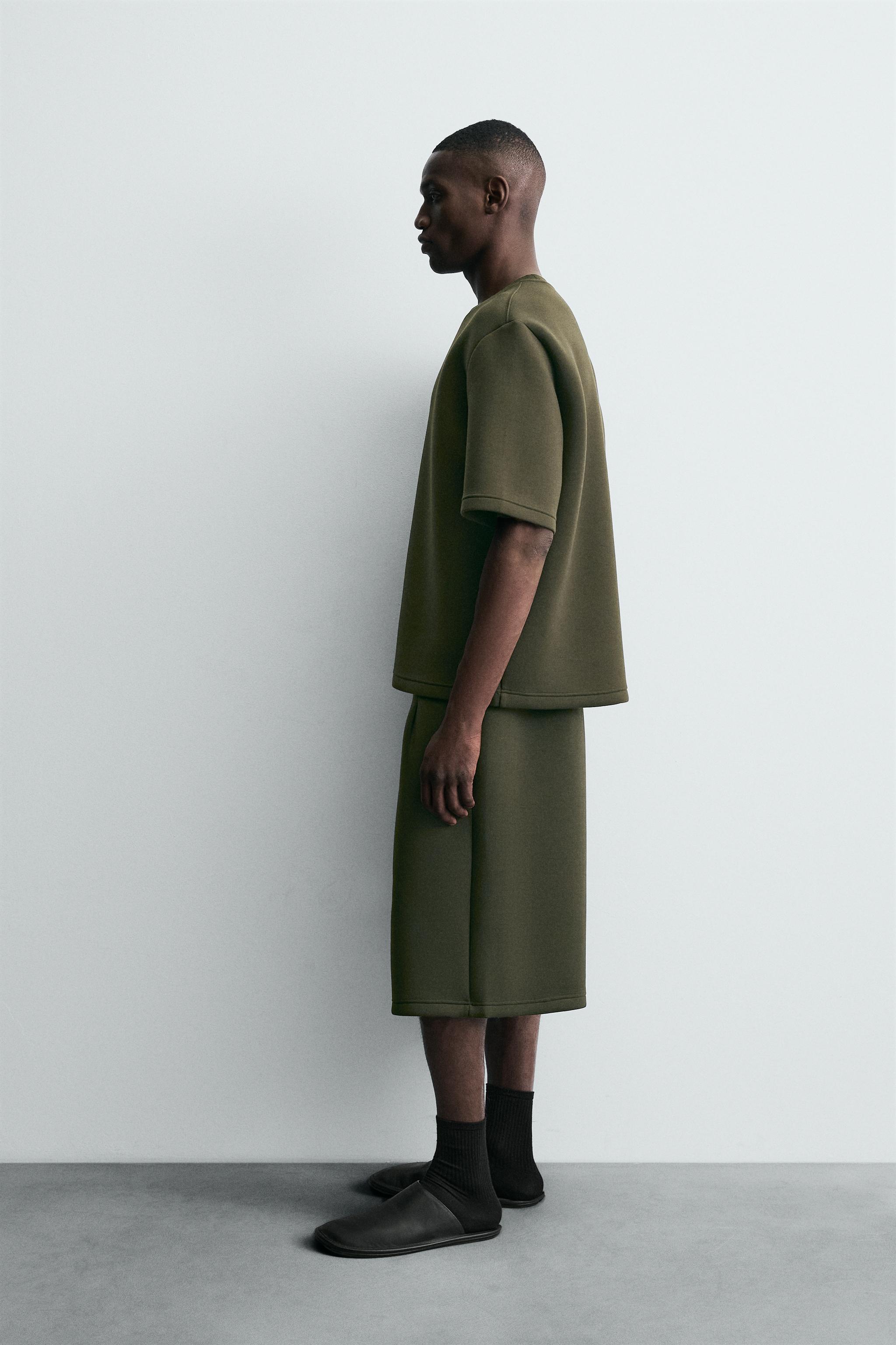 NEOPRENE EFFECT SHORTS WITH DARTS